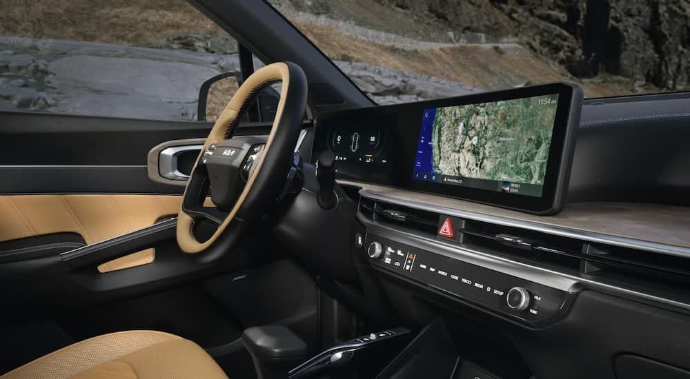 Black and tan interior and dash in a 2026 Kia Sorento for sale.