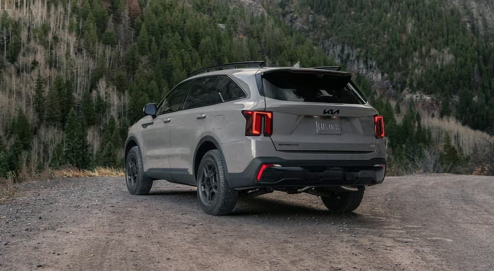 A gray 2026 Kia Sorento parked off-road.