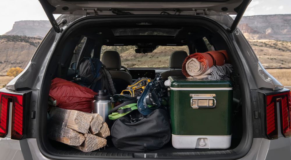 Rear cargo area packed in a gray 2026 Kia Sorento X-Pro Prestige.