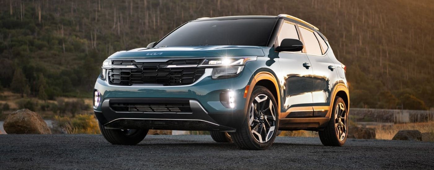 Blue 2024 Kia Seltos parked at an angle