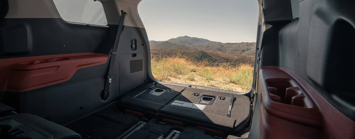 The rear interior space of a 2026 Kia Carnival.